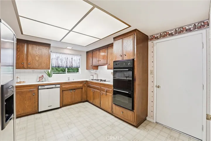 Kitchen is spacious with tons of storage and countertop space!
