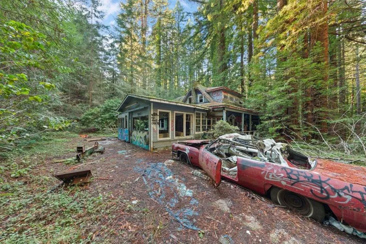 Main house viewed from driveway, not habitable.