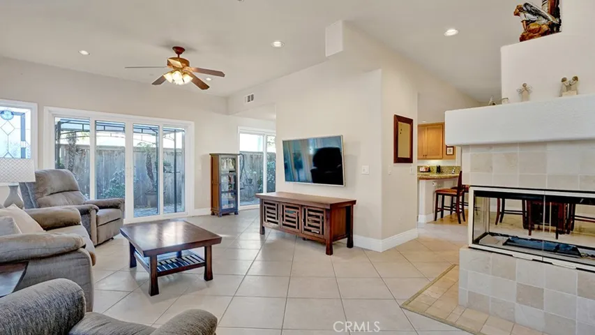 A gas fireplace and an open floor plan are two highlights of the downstairs living area.