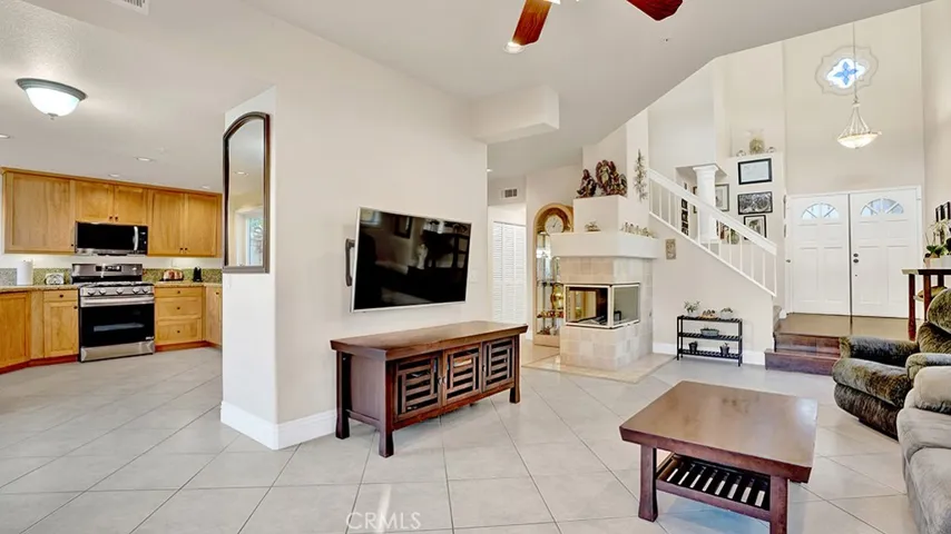 The living room is open to the kitchen since a hal wall was removed.