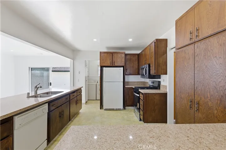 New quartz countertops with new sink and faucet