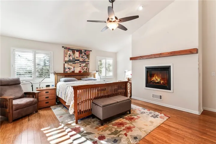 A fireplace is romantic in this bedroom.