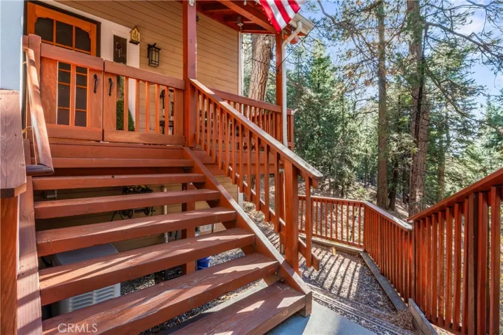 Few steps to the front door and patio.