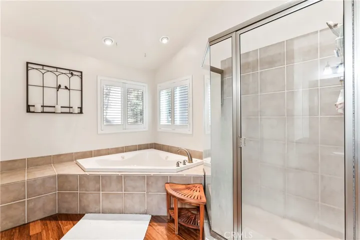 large spa tub and separate shower.