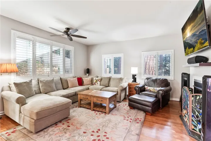 Large windows throughtout fill the home with natural light and serene views of surrounding trees.