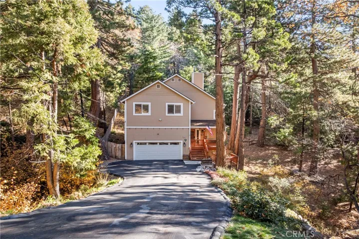 A long driveway and two- car garage provides generous parking.