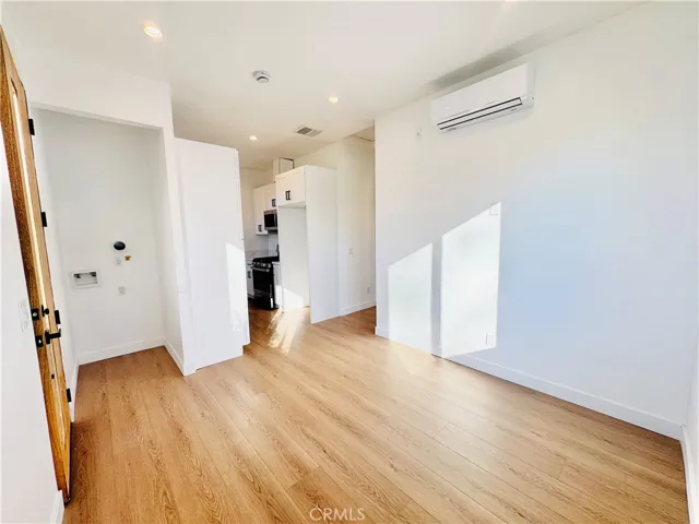 Living room with high ceillings, alternate view
