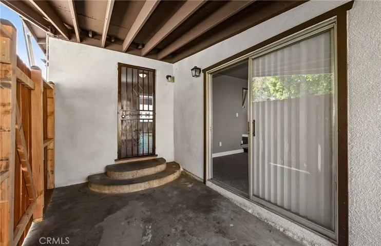 Private entry to third bedroom and Den/Game Room to the right.