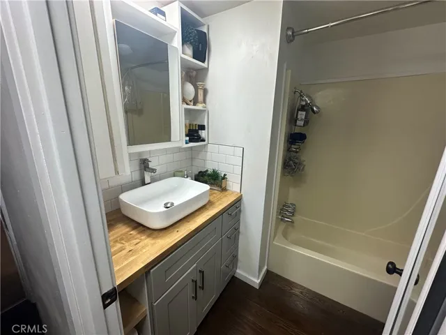Full Hallway Bathroom with Tub and Shower