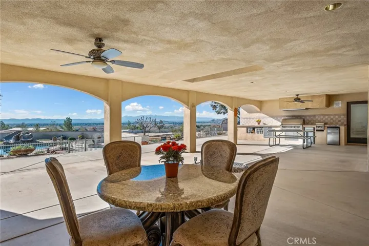 This home features a generous expense-covered back patio with clear sight lines to the pristine pool area.