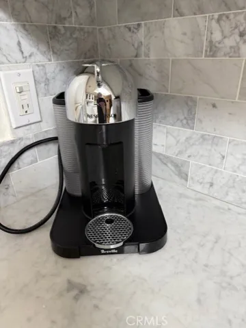 Nespresso Coffee Maker.  Kitchen is Fully Equipped.