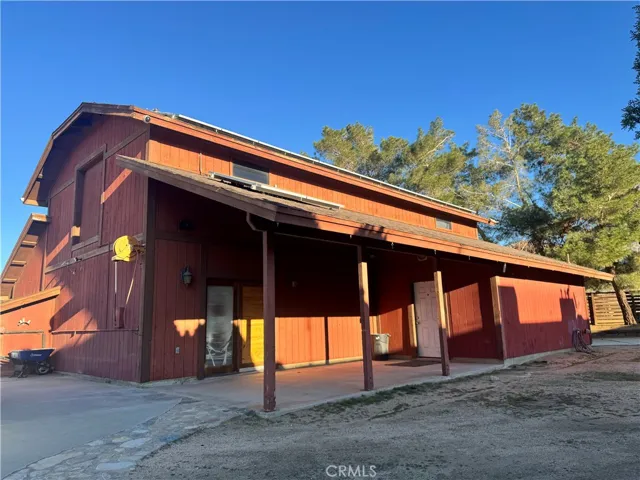 Huge 2 story Barn/workshop. Can store up to a lot of cars, boats and toys. Possible an amazing mancave.