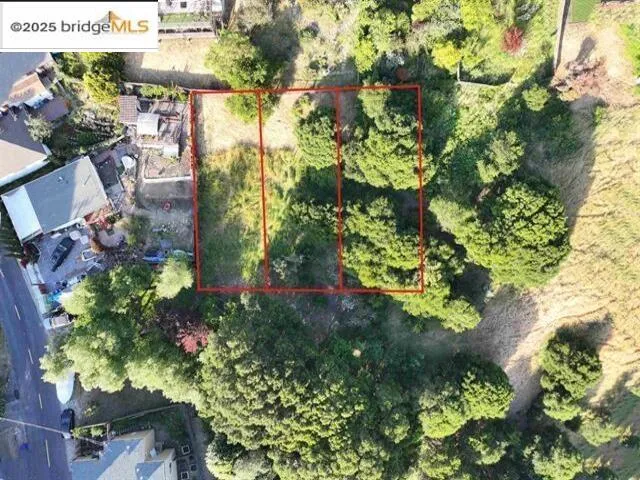 Aerial overview of property's location with property parcel outlined