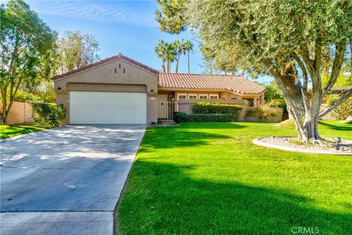 Front of house, large driveway