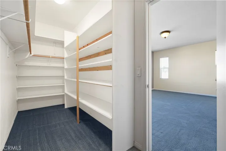 Upstairs: Master Bedroom Walk-in closet