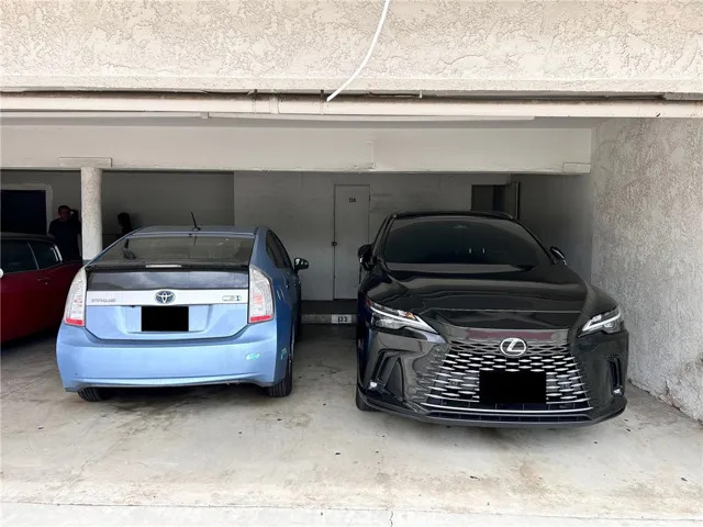 2 side by side assigned parking spots
