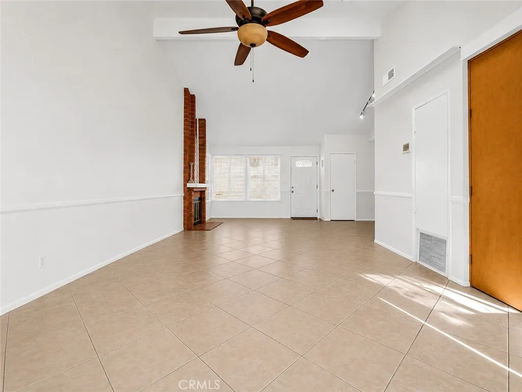 large living room with vaulted ceilings