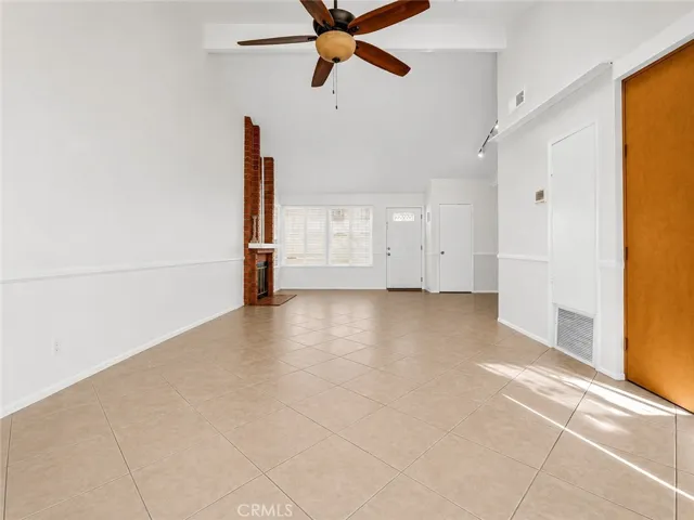 large living room with vaulted ceilings