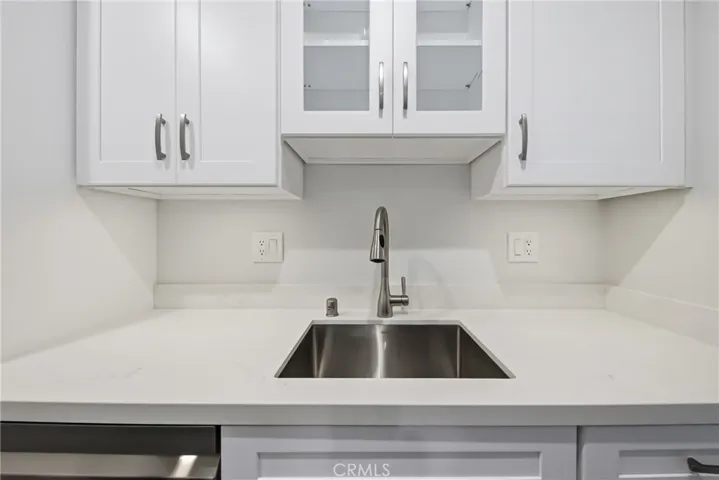 Brand new sink,Quartz counters and 
shaker cabinets