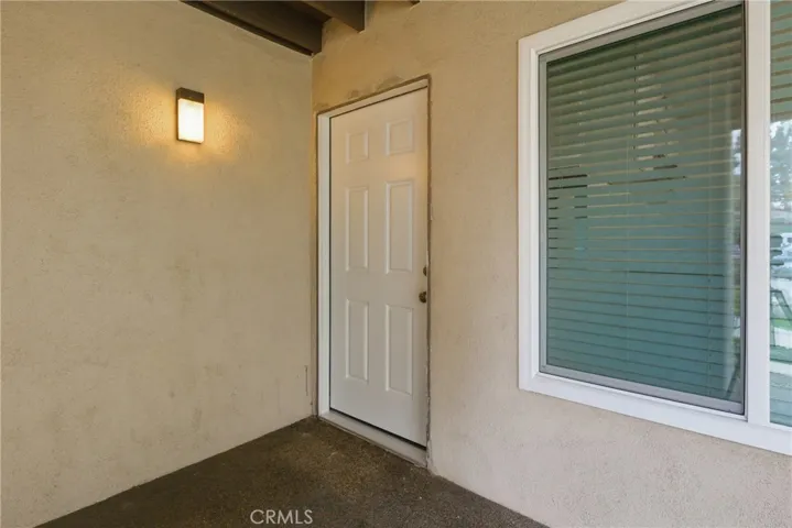 Porch offers private storage closet.
