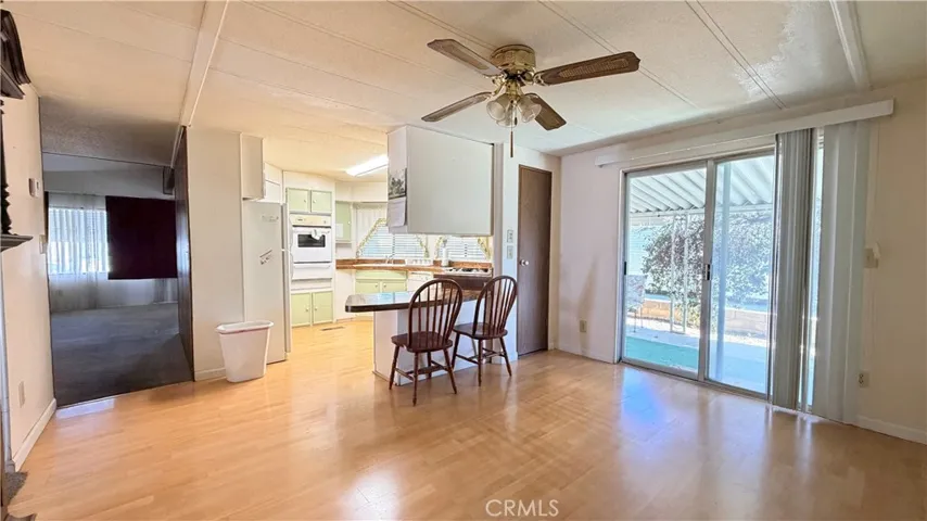Kitchen, dining area, and walk way to living room