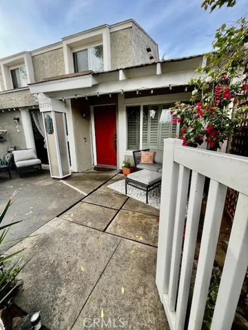 ENTRANCE TO PATIO AND FRONT ENTRY DOOR