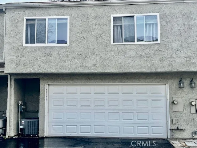 PRIVATE TWO CAR GARAGE WITH DIRECT UNIT ACCESS