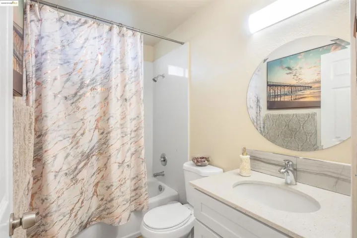Full bathroom featuring vanity and shower / bath combo