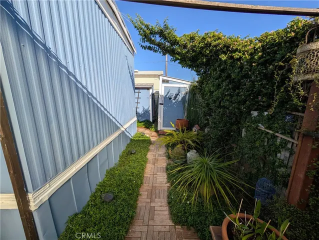 Walkway from Storage Sheds to Backyard Patio