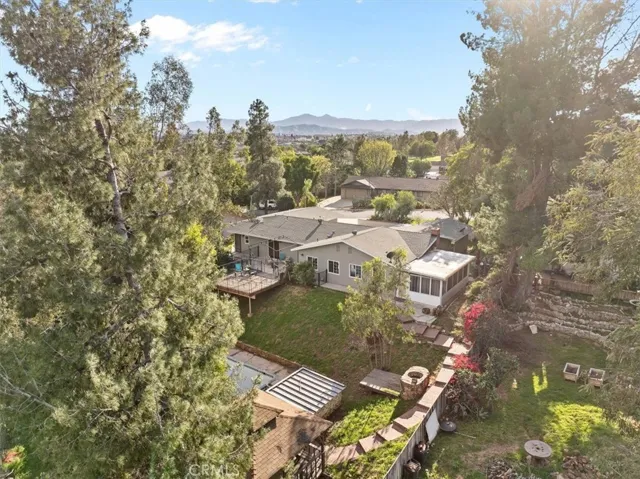 Rear Drone View of Lush Back Yard