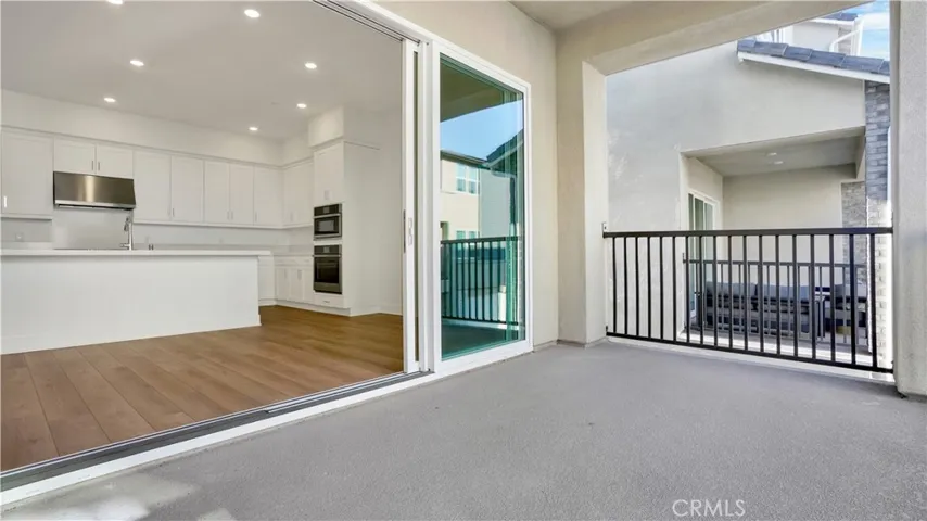 Large patio with open concept of indoor/outdoor living.  Truly expands the feel of the property!