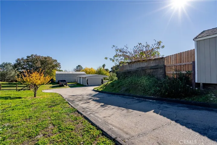 The driveway accesses the back part of the property.