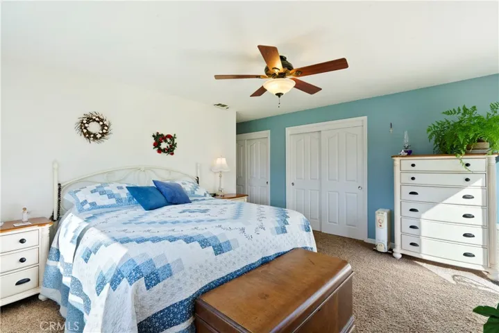 The primary bedroom boasts 2 closets and plenty of space to enjoy at the end of the day.