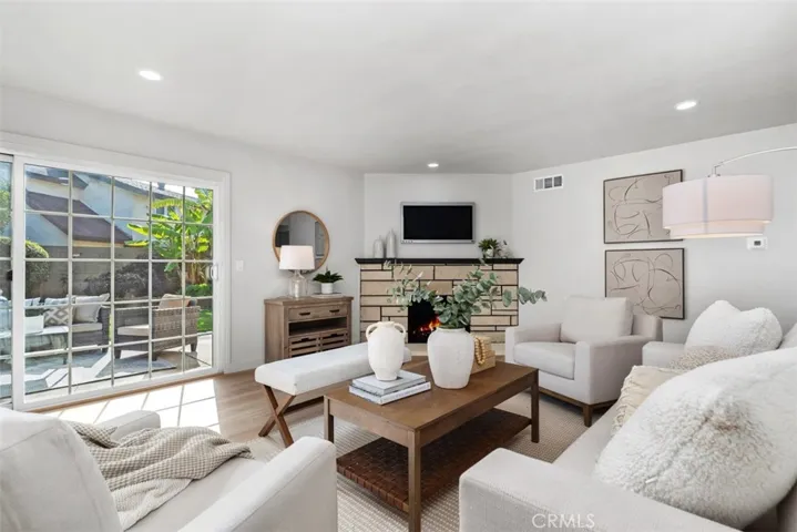 You'll enjoy the tranquility of this lovely home while taking in the outdoor garden & patio!