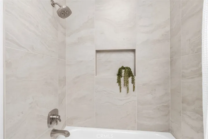 New Tub with Shower overhead where you can take a "bubble bath" or just soak and relax!