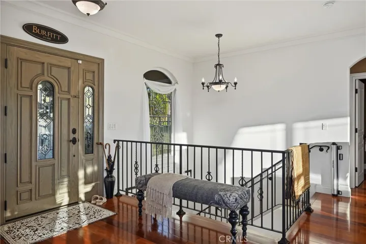 Stairs lead to lower level