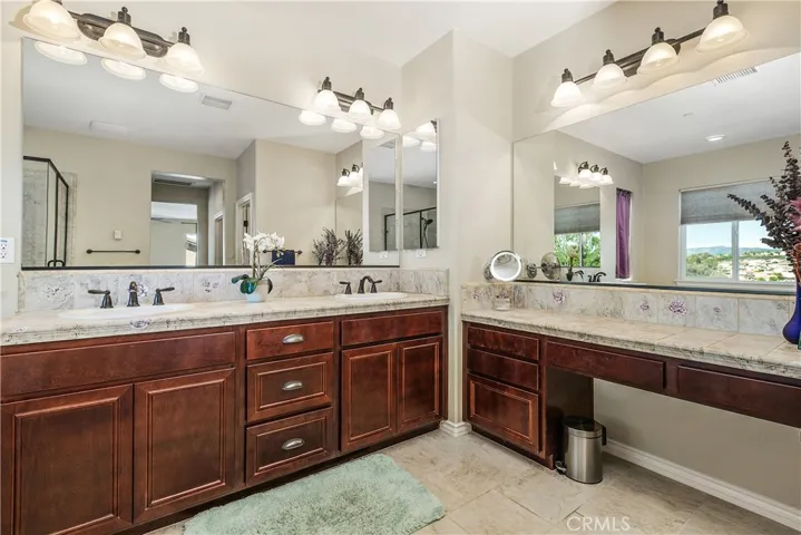 Dual sinks and a  separate vanity area