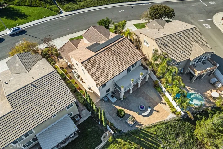 Full Ariel View of the  beautiful home. Showing the solar panels and no homes in front of you or behind!