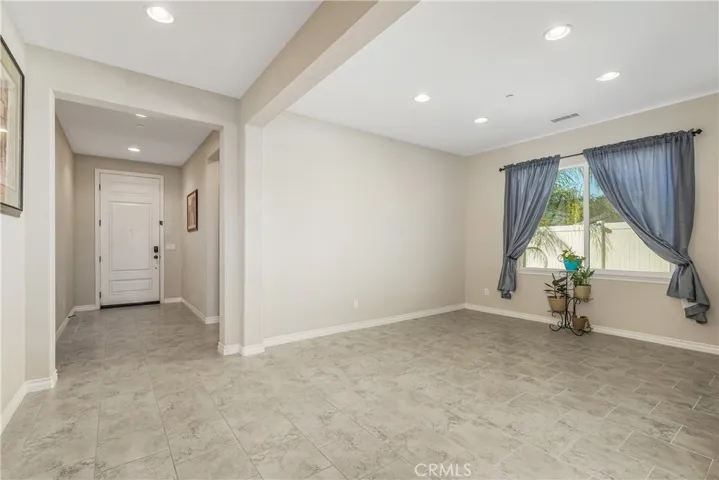Dining Room with recessed lighting opens to the Great room.