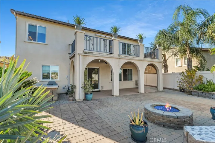 Another view of the large back yard, fully landscaped and hardscaped!