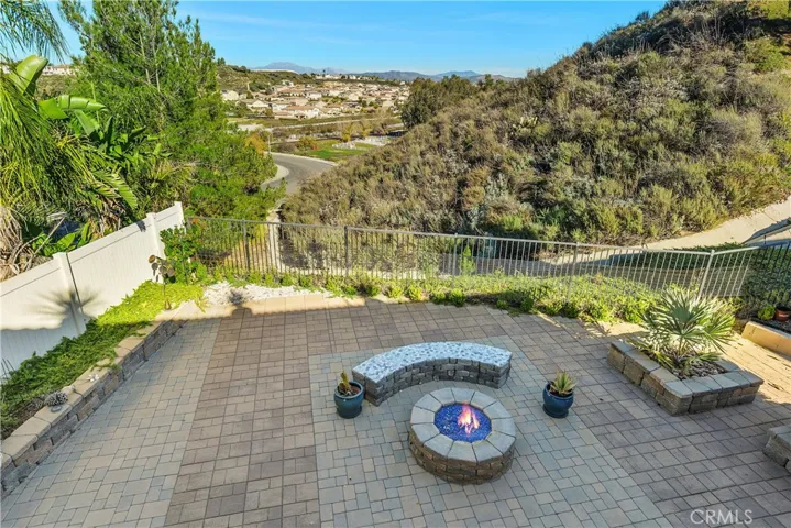 View from the Primary Deck onto the patio and mountains.