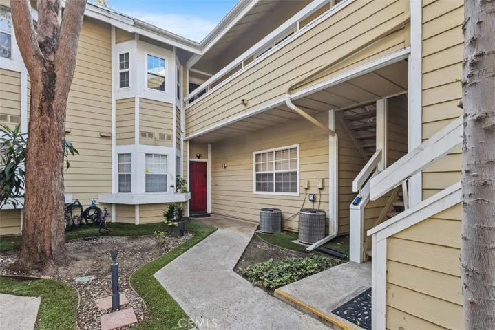 Courtyard, Unit is upstairs. Take stairs by Supra.
