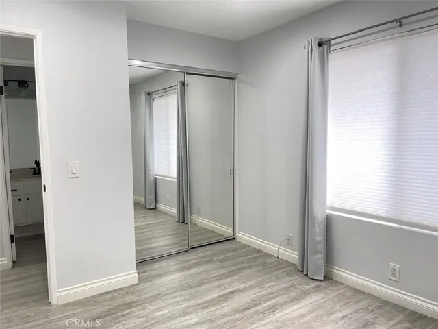 BEDROOM 1 - MIRRORED WARDROBE, WINDOW FACES FRONT
