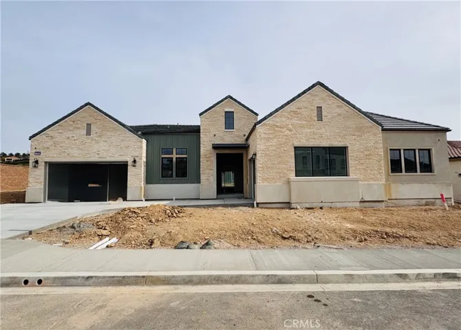 Front Elevation: Saddleback Modern Farmhouse - Ridge Collection at Bella Vista - Homesite 72 - Home is still under construction