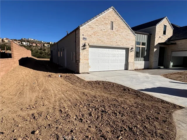 Front Elevation: Saddleback Modern Farmhouse - Ridge Collection at Bella Vista - Homesite 72 - Home is still under construction