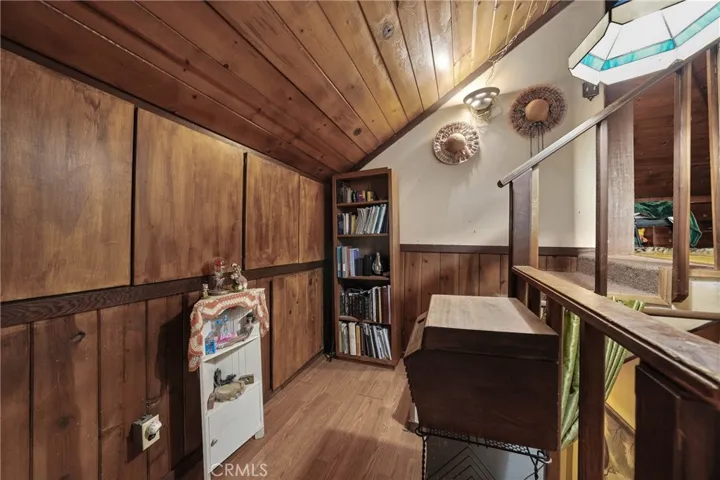 landing with storage at top of stairs leads up to 3rd room
