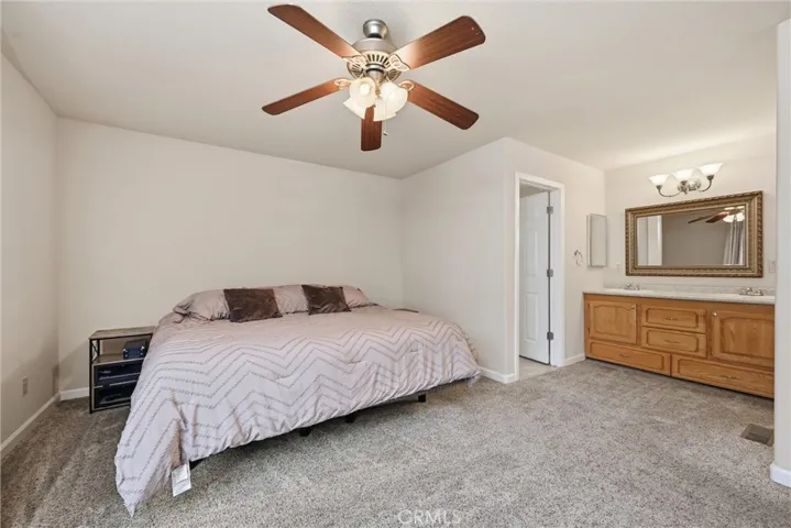 Primary bedroom and vanity area.