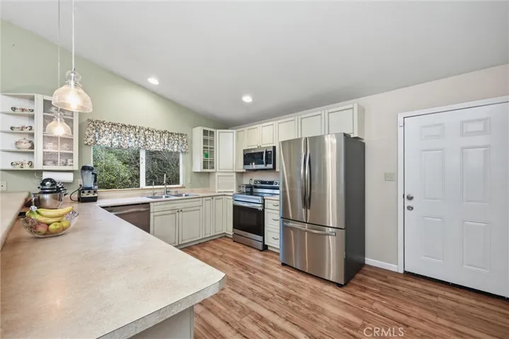 So much counter space and convenient door to the back deck.