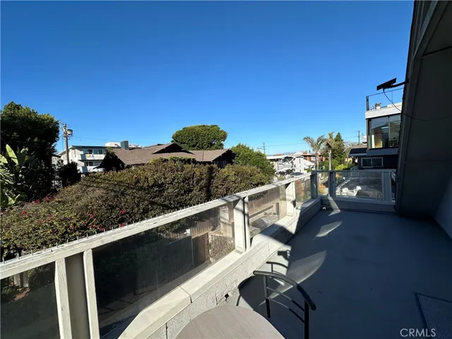 Second-floor balcony overlooking 30th Ave Walkstreet and surrounding community