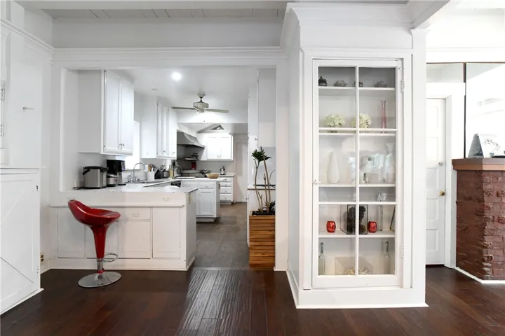 Kitchen — glass cabinetry & built-ins